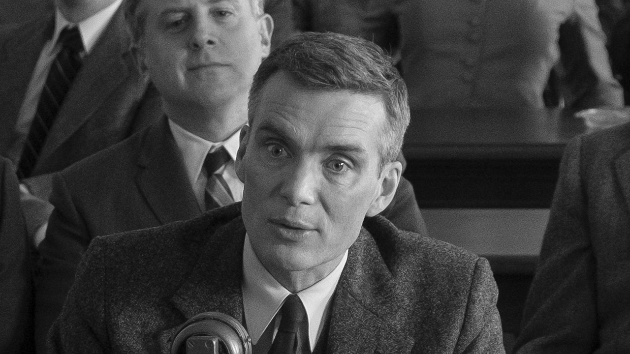 Cillian Murphy as J. Robert Oppenheimer in a courtroom hearing in Oppenheimer